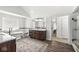 Bathroom featuring a freestanding tub, double vanity, and tiled walk-in shower at 3790 Steeplechase Dr, Carmel, IN 46032