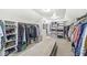 Large walk-in closet featuring custom shelves and clothing racks, providing ample storage space at 3790 Steeplechase Dr, Carmel, IN 46032