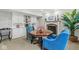 Sitting area with a fireplace, armchairs, and built-in storage at 3790 Steeplechase Dr, Carmel, IN 46032