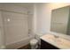 A bathroom featuring a combined shower and tub, toilet, and sink with vanity at 3832 Highcrest Rd, Indianapolis, IN 46239