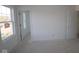 Bright, unfinished bedroom with two windows offering natural light, ready for your personal design at 3832 Highcrest Rd, Indianapolis, IN 46239
