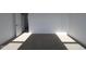 Bright bedroom with neutral carpet, white trim, and a doorway that leads to the rest of the house at 3832 Highcrest Rd, Indianapolis, IN 46239