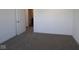 Bright bedroom with neutral carpet, white trim, and a doorway that leads to the rest of the house at 3832 Highcrest Rd, Indianapolis, IN 46239