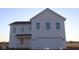 Charming new two-story home showcasing a symmetrical design with multiple windows and a two-car garage at 3832 Highcrest Rd, Indianapolis, IN 46239