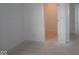Bright, unfinished hallway offering natural light and access to other rooms, ready for your personal design at 3832 Highcrest Rd, Indianapolis, IN 46239