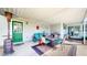 Covered back porch with seating area, grill, and outdoor furniture at 4243 Bay Leaf Cir, Indianapolis, IN 46237