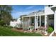 Charming backyard patio with white picket fence and manicured lawn, perfect for outdoor entertaining at 4243 Bay Leaf Cir, Indianapolis, IN 46237
