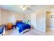 Well-lit bedroom with neutral colored walls, a ceiling fan, and carpeted floor at 4243 Bay Leaf Cir, Indianapolis, IN 46237