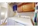 Bright laundry room featuring a side-by-side washer and dryer at 4243 Bay Leaf Cir, Indianapolis, IN 46237