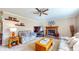 Spacious living room featuring a brick fireplace, plush seating, and stylish decor at 4243 Bay Leaf Cir, Indianapolis, IN 46237