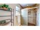 Updated walk-in shower featuring a glass door, new tile and upgraded fixtures at 4243 Bay Leaf Cir, Indianapolis, IN 46237