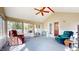 Inviting sunroom offering ample natural light and comfortable seating with views of the outdoors at 4243 Bay Leaf Cir, Indianapolis, IN 46237