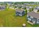 Spacious backyard view featuring patio, play-set and well-manicured lawn at 4245 W Fork Dr, Westfield, IN 46062