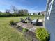 Expansive backyard featuring a charming patio area with outdoor seating at 4245 W Fork Dr, Westfield, IN 46062