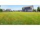Spacious backyard featuring lush green grass with plenty of space for outdoor activities at 4245 W Fork Dr, Westfield, IN 46062