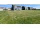 Spacious backyard showing the home and a large lawn area at 4245 W Fork Dr, Westfield, IN 46062