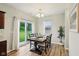 Bright dining area with sliding glass doors to the backyard, perfect for indoor-outdoor living at 4245 W Fork Dr, Westfield, IN 46062