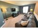 Comfortable living room with cozy seating, tv, and a reading lamp at 4245 W Fork Dr, Westfield, IN 46062