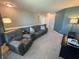 Upstairs living room with cozy seating, tv, reading lamp and plenty of space at 4245 W Fork Dr, Westfield, IN 46062