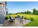 Cozy outdoor patio area with comfortable seating and vibrant flowers for a relaxing atmosphere at 4245 W Fork Dr, Westfield, IN 46062