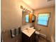 Tiled bathroom with a vanity, medicine cabinet, and shower-tub combination at 4335 River Rd, Columbus, IN 47203