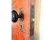 Classic antique doorknob and decorative plate highlight the home's vintage character at 4335 River Rd, Columbus, IN 47203