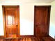 Pair of original wooden interior doors that provide a glimpse into the homes unique character at 4335 River Rd, Columbus, IN 47203