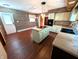 Well-lit kitchen features a center island, updated appliances, and stylish cabinetry with access to the backyard at 4335 River Rd, Columbus, IN 47203