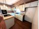 Functional kitchen features updated appliances, ample counter space, and stylish cabinetry for a modern feel at 4335 River Rd, Columbus, IN 47203
