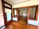 Entryway with hardwood floors and an entryway with wooden pillars at 4335 River Rd, Columbus, IN 47203