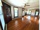 Living room with hardwood floors and built in storage at 4335 River Rd, Columbus, IN 47203