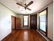 Living room with hardwood floors, windows, and an entryway at 4335 River Rd, Columbus, IN 47203