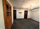 Living room with wood paneled doors and a chandelier at 4335 River Rd, Columbus, IN 47203