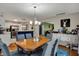 Open concept dining area that connects to the kitchen and living spaces at 4511 Hunt Master Ct, Indianapolis, IN 46268