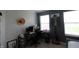 This bedroom is set up as a lovely and bright office space with multiple windows at 5266 Hickory Lake Dr, Indianapolis, IN 46235