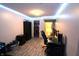 Finished basement bedroom featuring closet, wood grain floors, and stylish blue LED accent lighting at 5266 Hickory Lake Dr, Indianapolis, IN 46235