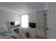 Bright bedroom with modern vanity, white walls, and soft lighting, creating a serene and inviting atmosphere at 5266 Hickory Lake Dr, Indianapolis, IN 46235
