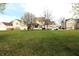 Charming home with well-maintained lawn and mature trees, showcasing curb appeal at 5266 Hickory Lake Dr, Indianapolis, IN 46235