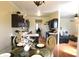 Bright kitchen features dark cabinetry, stainless steel appliances, and an eat-in dining area at 5266 Hickory Lake Dr, Indianapolis, IN 46235