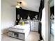 Charming main bedroom with a unique dark accent wall, modern furniture, and soft natural light at 5266 Hickory Lake Dr, Indianapolis, IN 46235