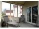 Relaxing screened patio with comfortable seating and views of the backyard at 5266 Hickory Lake Dr, Indianapolis, IN 46235