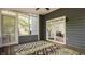 Inviting screened porch with sliding glass door access to the interior at 5467 Winterhazel Dr, Indianapolis, IN 46254