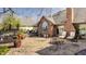 Beautiful backyard with patio, fire pit, outdoor furniture, and views of the lake at 5872 Lake Kessler Ct, Indianapolis, IN 46226