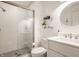 Modern bathroom featuring a glass-enclosed shower and stylish white vanity at 5872 Lake Kessler Ct, Indianapolis, IN 46226