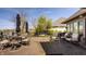 Outdoor deck featuring outdoor dining area, lounge chairs and views of the water at 5872 Lake Kessler Ct, Indianapolis, IN 46226
