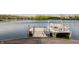 Beautiful view of dock with boat, perfect for relaxing and enjoying waterfront living and scenic vistas at 5872 Lake Kessler Ct, Indianapolis, IN 46226