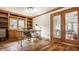 Cozy home office with built-in shelves and bright windows, perfect for remote work at 5872 Lake Kessler Ct, Indianapolis, IN 46226