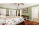 Well-lit main bedroom with en suite wet bar and decorative rug at 5872 Lake Kessler Ct, Indianapolis, IN 46226