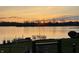 Beautiful waterfront property with serene lake views at sunset at 5872 Lake Kessler Ct, Indianapolis, IN 46226