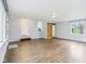 Spacious basement with wood-look floors, barn door, and plenty of natural light at 600 Alexandria Pike, Anderson, IN 46012